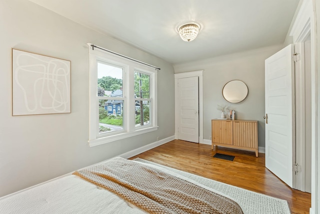 1112 29th Ave NE, Minneapolis, MN 55418 - bedroom with wood finished floors and baseboards