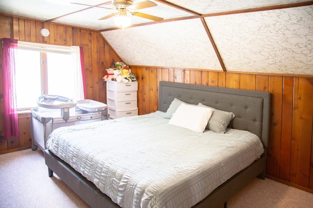 8029 2nd Ave S, Bloomington, MN 55420 - carpeted bedroom featuring lofted ceiling, wooden walls, and ceiling fan