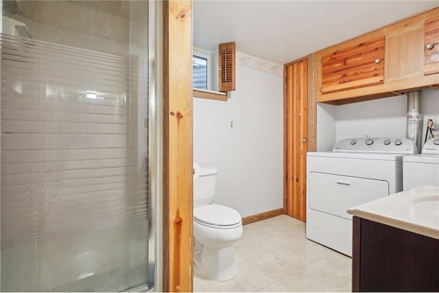 8029 2nd Ave S, Bloomington, MN 55420 - bathroom with a shower stall, washer and dryer, vanity, and tile patterned floors