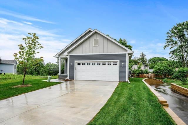 201 Mccarrons Pl W, Roseville, MN 55113 - view of front of home with board and batten siding, a front lawn, driveway, and a garage