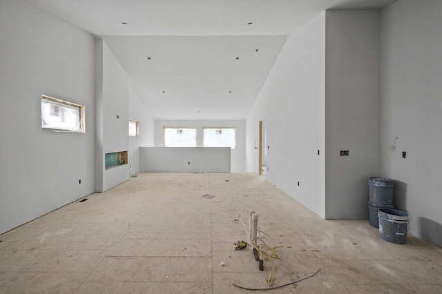 201 Mccarrons Pl W, Roseville, MN 55113 - unfurnished living room with vaulted ceiling