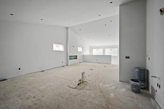 201 Mccarrons Pl W, Roseville, MN 55113 - unfurnished living room with lofted ceiling