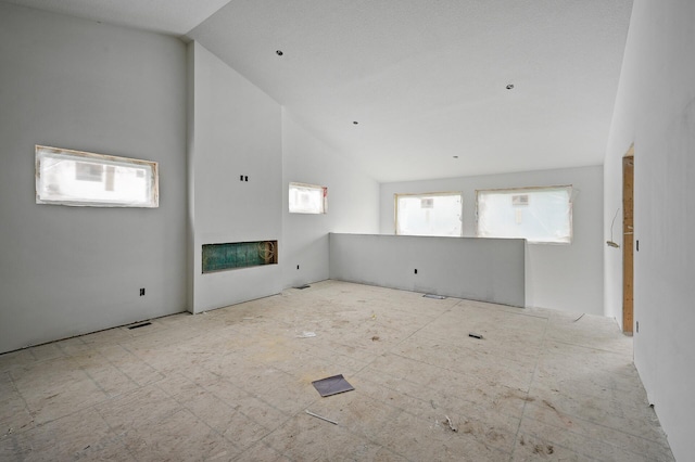 201 Mccarrons Pl W, Roseville, MN 55113 - unfurnished living room featuring lofted ceiling