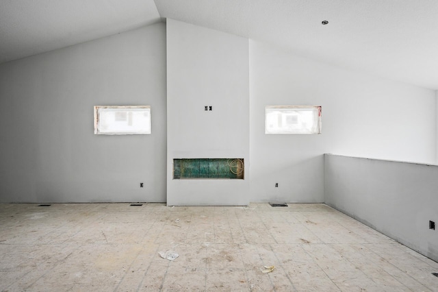 201 Mccarrons Pl W, Roseville, MN 55113 - additional living space featuring vaulted ceiling and a fireplace