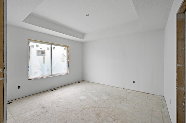 201 Mccarrons Pl W, Roseville, MN 55113 - empty room with a tray ceiling
