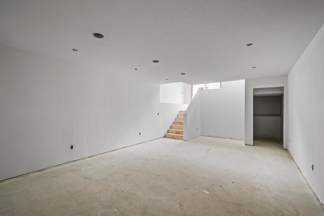201 Mccarrons Pl W, Roseville, MN 55113 - finished basement featuring stairs and a textured ceiling