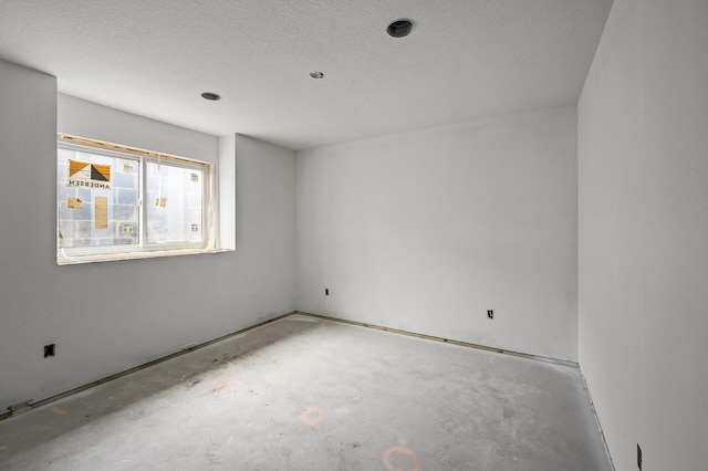 201 Mccarrons Pl W, Roseville, MN 55113 - empty room featuring a textured ceiling