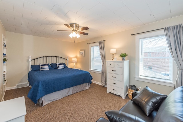 116 3rd Ave, Crosby, MN 56441 - carpeted bedroom with a ceiling fan and baseboards