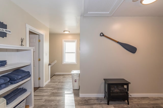 116 3rd Ave, Crosby, MN 56441 - bathroom with a wood stove and wood finished floors