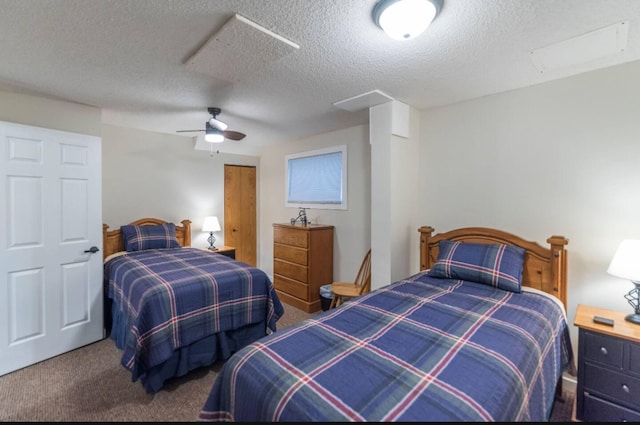 116 3rd Ave, Crosby, MN 56441 - carpeted bedroom featuring a textured ceiling, a closet, and a ceiling fan