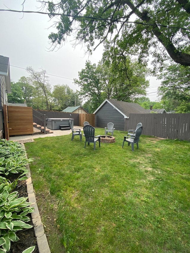 116 3rd Ave, Crosby, MN 56441 - fenced backyard featuring an outdoor fire pit