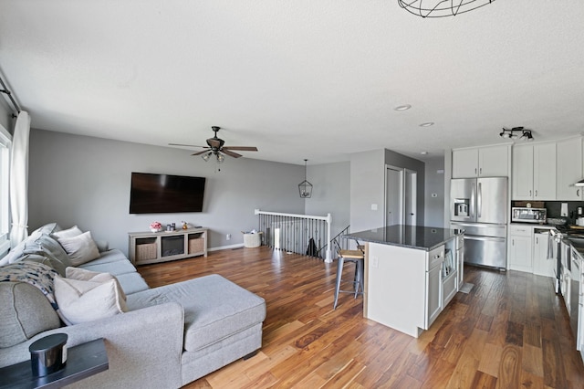 3576 Avon Ct, Woodbury, MN 55125 - living area with a ceiling fan, dark wood-type flooring, and recessed lighting
