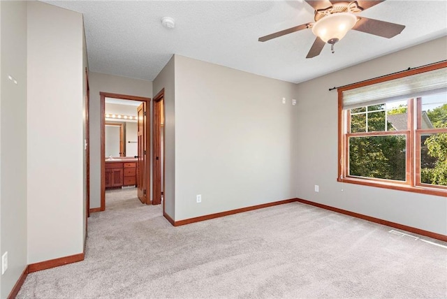 641 Lake St N, Big Lake, MN 55309 - unfurnished room featuring light colored carpet, ceiling fan, and a smoke detector