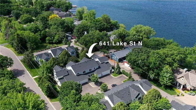 641 Lake St N, Big Lake, MN 55309 - aerial view of residential area featuring a large body of water