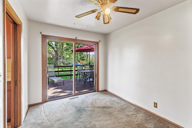 6112 Kyle Ave N, Brooklyn Center, MN 55429 - spare room featuring carpet floors and ceiling fan