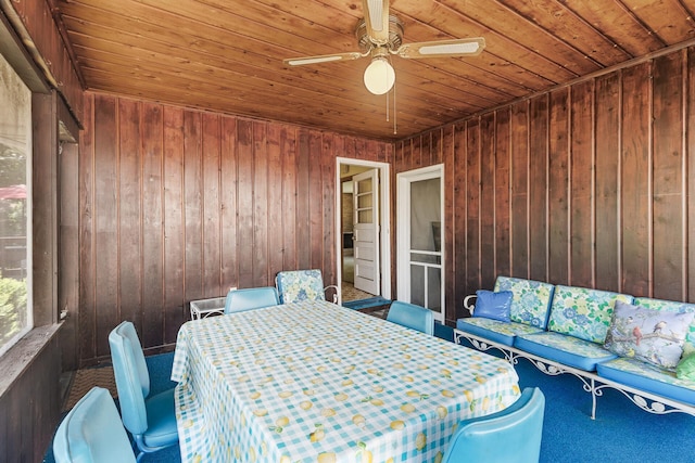 6112 Kyle Ave N, Brooklyn Center, MN 55429 - sunroom with ceiling fan and outdoor dining area