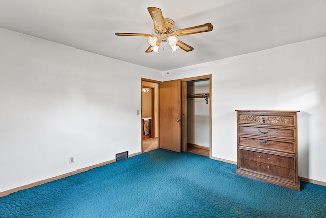 6112 Kyle Ave N, Brooklyn Center, MN 55429 - unfurnished bedroom featuring carpet floors, a closet, and ceiling fan