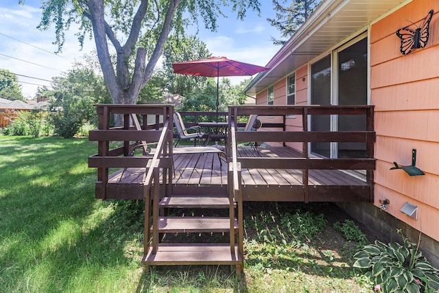 6112 Kyle Ave N, Brooklyn Center, MN 55429 - wooden deck featuring a lawn