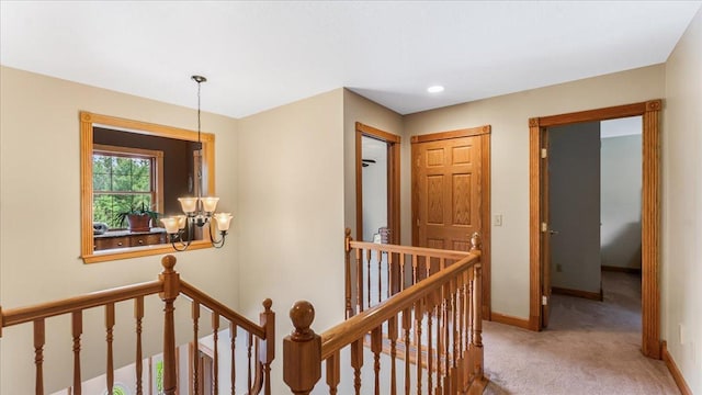 1764 State 84 SW, Pine River, MN 56474 - hallway with an upstairs landing, carpet flooring, a chandelier, and recessed lighting