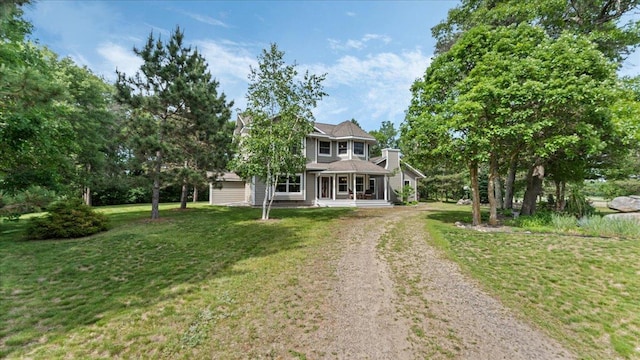 1764 State 84 SW, Pine River, MN 56474 - view of front facade featuring driveway, a front yard, and covered porch