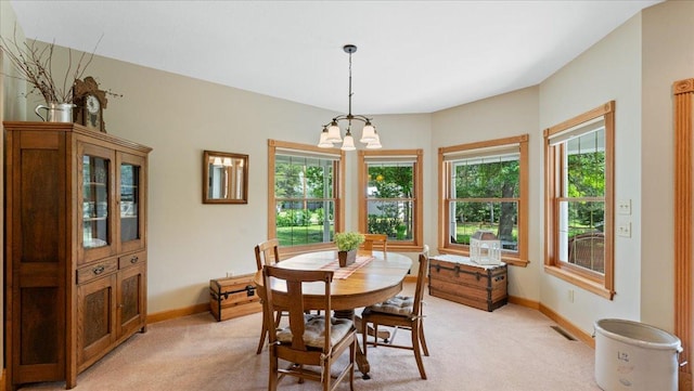 1764 State 84 SW, Pine River, MN 56474 - dining room with light colored carpet and a chandelier