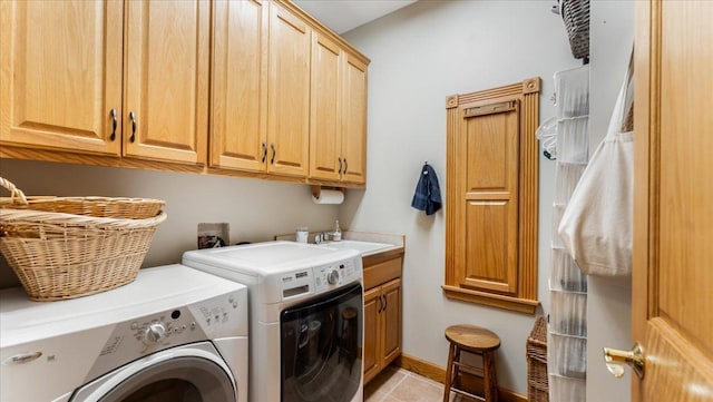 1764 State 84 SW, Pine River, MN 56474 - laundry room featuring washer and clothes dryer, cabinet space, and light tile patterned floors