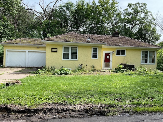 11405 Timberline Rd, Minnetonka, MN 55305 - bungalow-style home with stucco siding, an attached garage, driveway, a front lawn, and a chimney