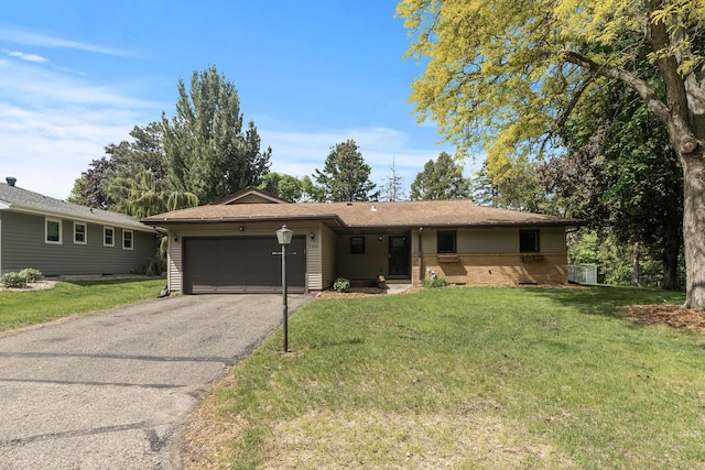 755 Keokuk Ln, Mendota Heights, MN 55120 - ranch-style house featuring an attached garage, driveway, and a front lawn