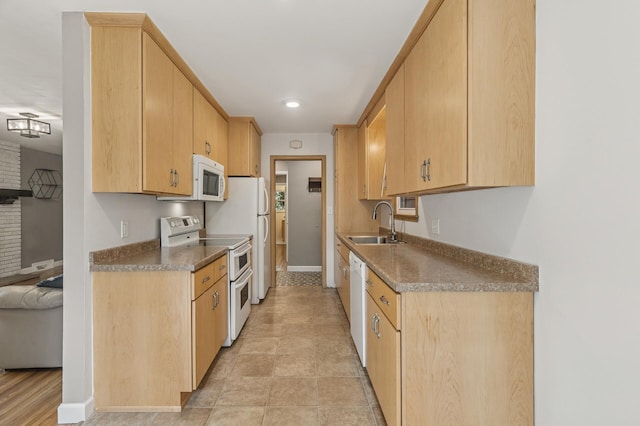 755 Keokuk Ln, Mendota Heights, MN 55120 - kitchen with white appliances, light brown cabinetry, and dark countertops