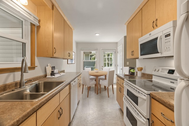 755 Keokuk Ln, Mendota Heights, MN 55120 - kitchen featuring white appliances, light brown cabinets, light floors, recessed lighting, and dark countertops