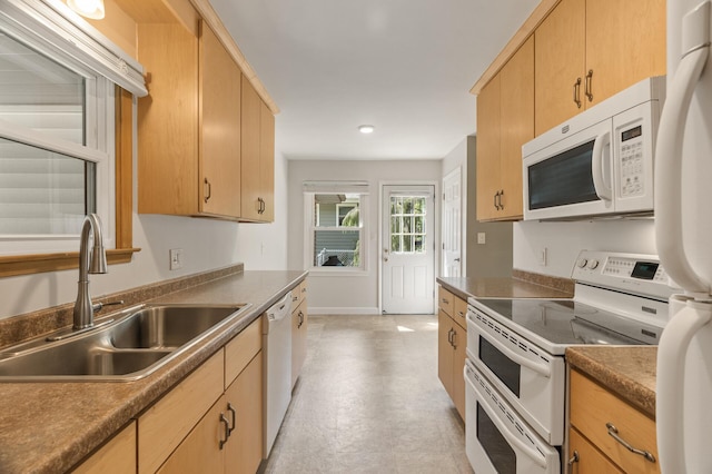 755 Keokuk Ln, Mendota Heights, MN 55120 - kitchen with white appliances, light brown cabinets, light flooring, recessed lighting, and dark countertops