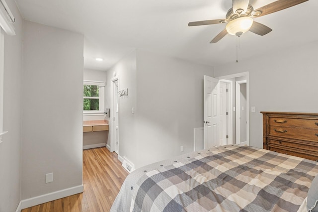 755 Keokuk Ln, Mendota Heights, MN 55120 - bedroom featuring light wood-type flooring, a ceiling fan, and ensuite bathroom