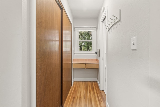 755 Keokuk Ln, Mendota Heights, MN 55120 - hall with light wood-style flooring and baseboards