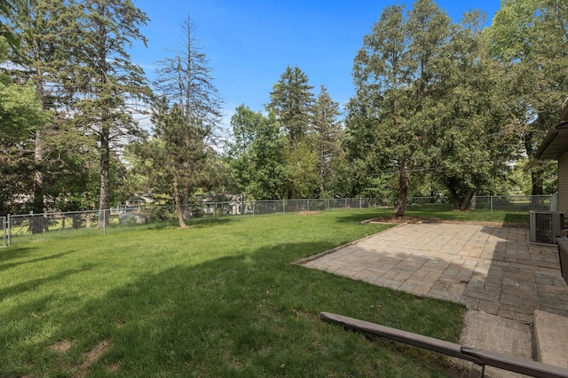 755 Keokuk Ln, Mendota Heights, MN 55120 - fenced backyard featuring a patio area