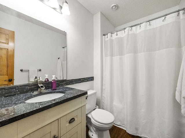 25533 Heritage Ln, Wyoming, MN 55092 - full bathroom featuring vanity, wood finished floors, and a textured ceiling