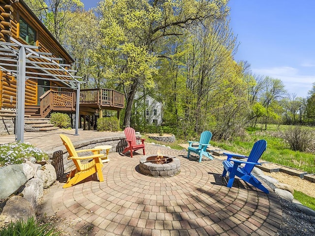 25533 Heritage Ln, Wyoming, MN 55092 - view of patio with an outdoor fire pit, a deck, and stairway