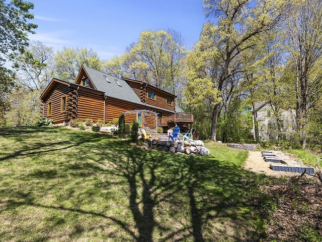 25533 Heritage Ln, Wyoming, MN 55092 - back of house with log siding, a wooden deck, a yard, stairs, and roof with shingles