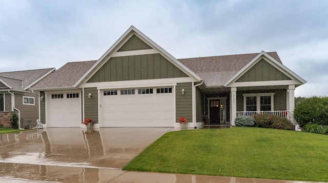 2745 Sand Trap Rd SE, Rochester, MN 55904 - craftsman house featuring board and batten siding, a garage, a front lawn, driveway, and roof with shingles
