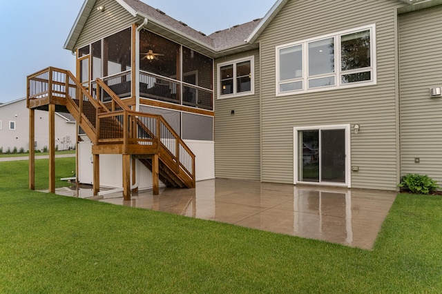 2745 Sand Trap Rd SE, Rochester, MN 55904 - back of property with a sunroom, a patio area, stairs, a yard, and ceiling fan