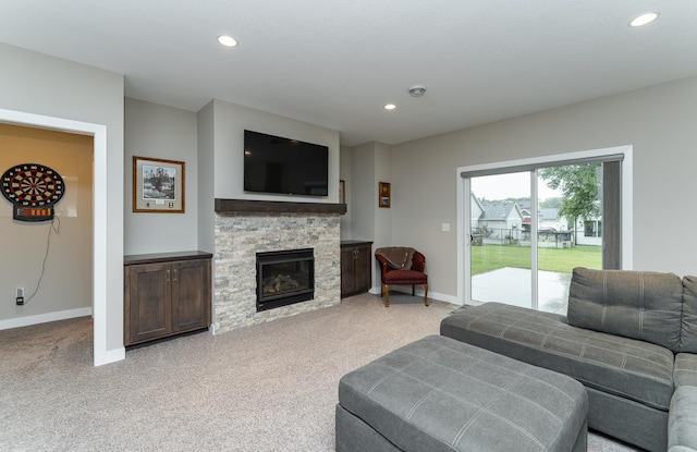 2745 Sand Trap Rd SE, Rochester, MN 55904 - living room with recessed lighting, light colored carpet, and a fireplace