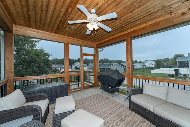 2745 Sand Trap Rd SE, Rochester, MN 55904 - sunroom with an outdoor hangout area, a ceiling fan, and a residential view