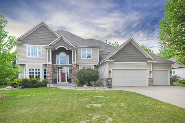 8051 Enclave Bay, Woodbury, MN 55125 - craftsman-style house with stone siding, concrete driveway, a garage, and a front yard