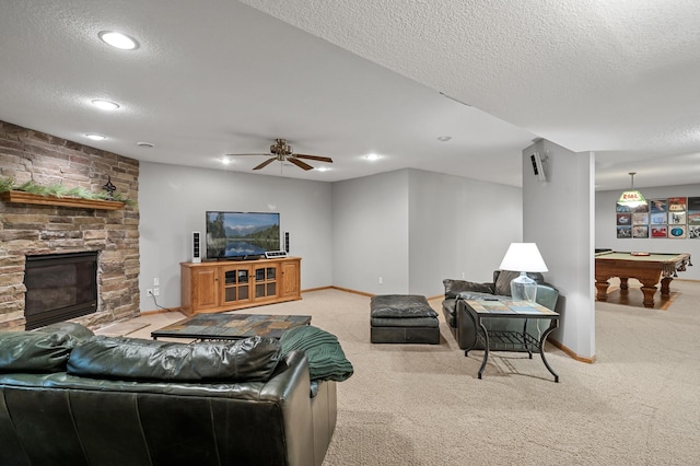 8051 Enclave Bay, Woodbury, MN 55125 - carpeted living area featuring a textured ceiling, billiards table, ceiling fan, recessed lighting, and a stone fireplace