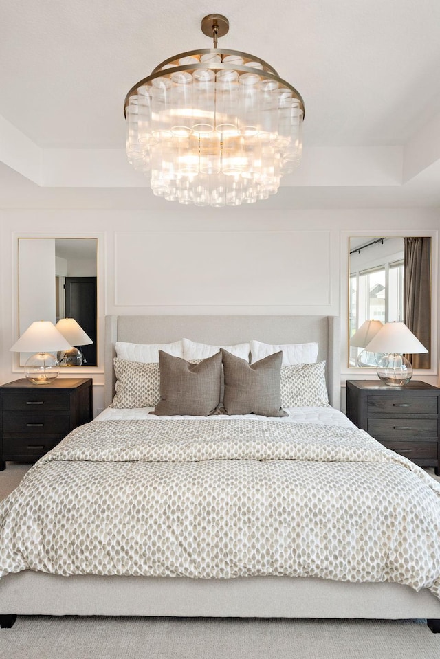 16942 47th Pl N, Plymouth, MN 55446 - bedroom with a chandelier and a raised ceiling