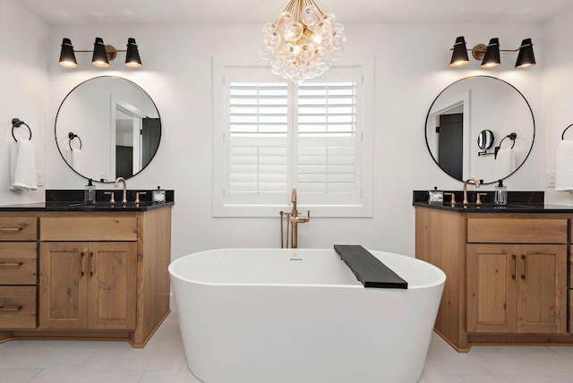 16942 47th Pl N, Plymouth, MN 55446 - full bathroom with tile patterned floors, two vanities, a freestanding tub, and a chandelier