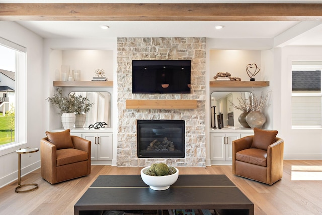 16942 47th Pl N, Plymouth, MN 55446 - living room featuring light wood finished floors, a fireplace, and beam ceiling