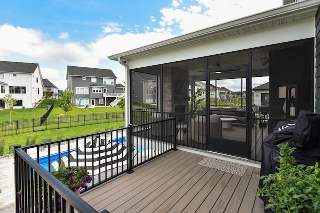 16942 47th Pl N, Plymouth, MN 55446 - deck featuring a fenced backyard, a residential view, a sunroom, and a patio