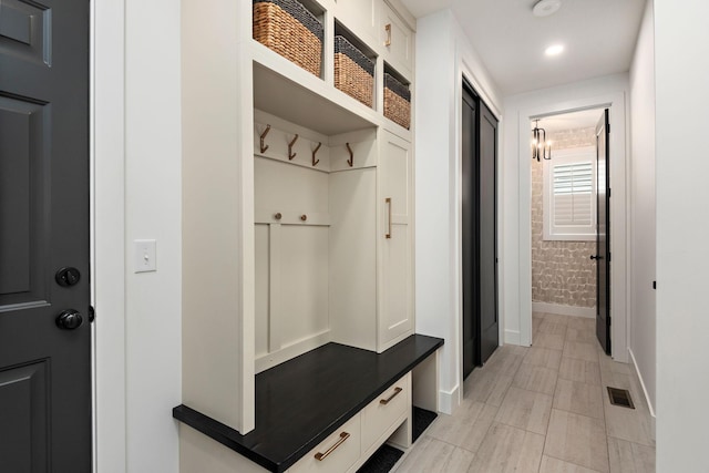 16942 47th Pl N, Plymouth, MN 55446 - mudroom with baseboards and recessed lighting
