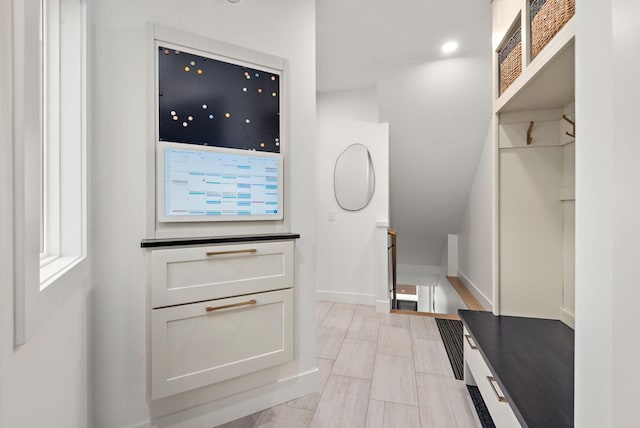 16942 47th Pl N, Plymouth, MN 55446 - mudroom featuring baseboards