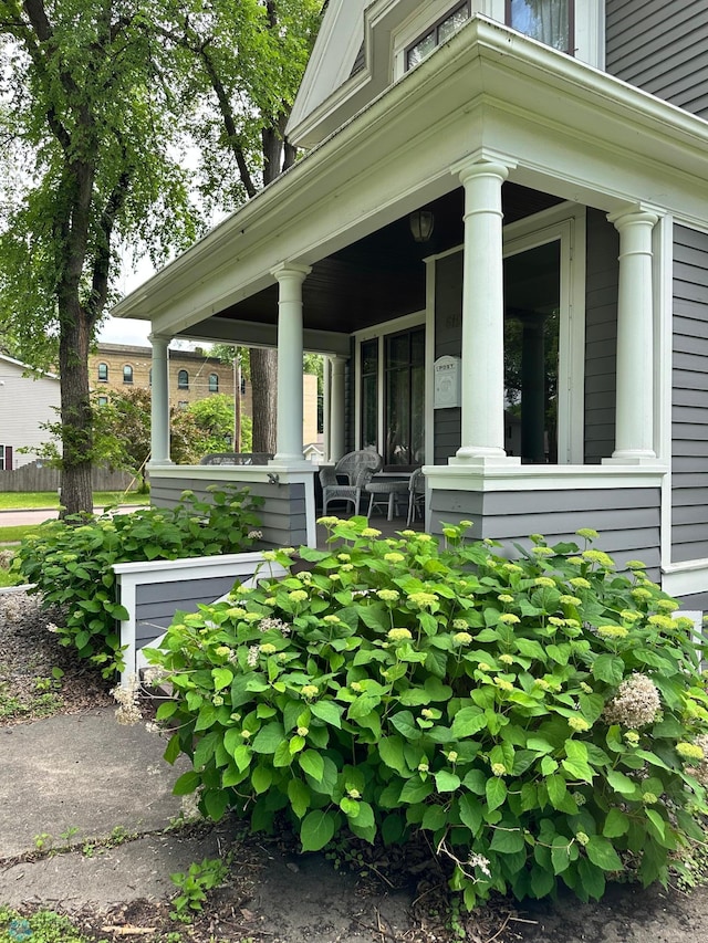 619 University Dr S, Fargo, ND 58103 - view of exterior entry featuring covered porch
